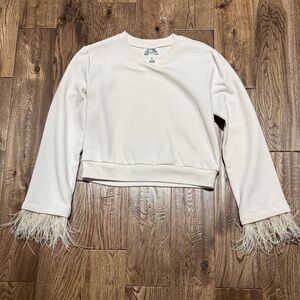 Blush cropped sweatshirt with feather trim. Sz S